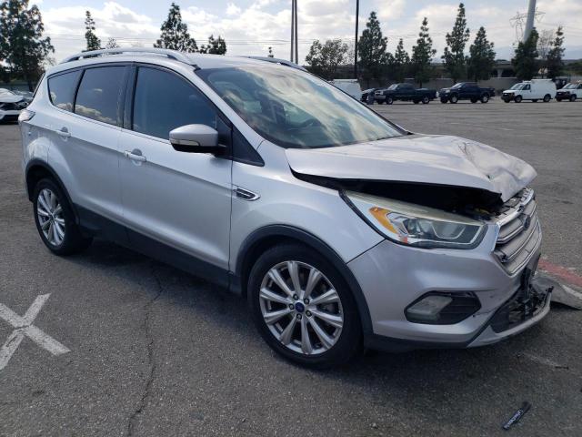 1FMCU0J99HUA65055 - 2017 FORD ESCAPE TITANIUM SILVER photo 4