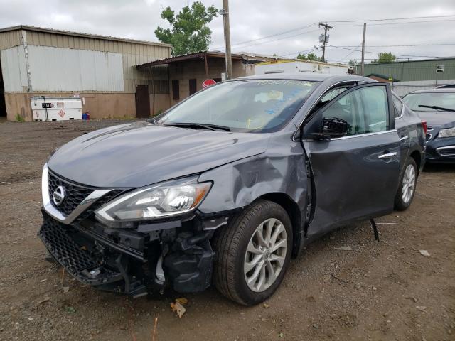 3N1AB7AP8JL635140 - 2018 NISSAN SENTRA S SILVER photo 2