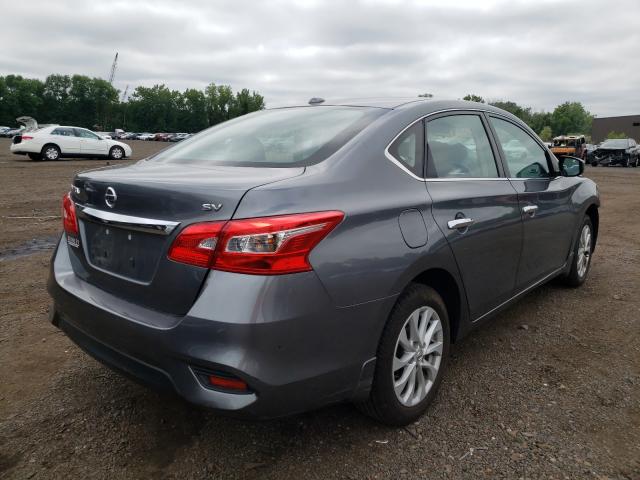 3N1AB7AP8JL635140 - 2018 NISSAN SENTRA S SILVER photo 4