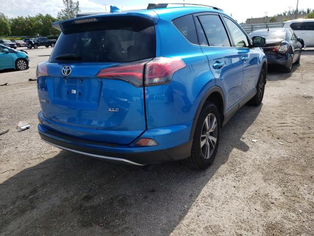 JTMWFREV1JJ204383 - 2018 TOYOTA RAV4 ADVENTURE BLUE photo 4