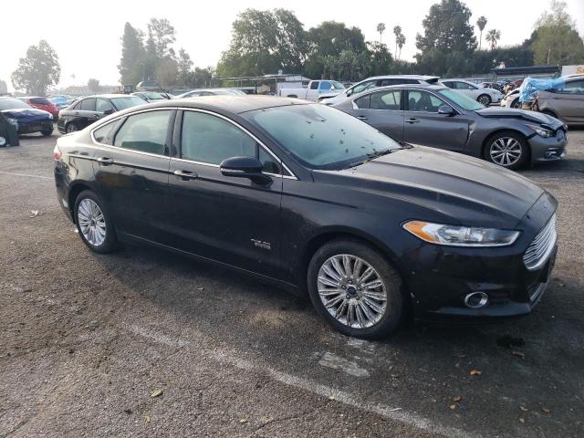 3FA6P0SU0ER366284 - 2014 FORD FUSION TITANIUM PHEV BLACK photo 4