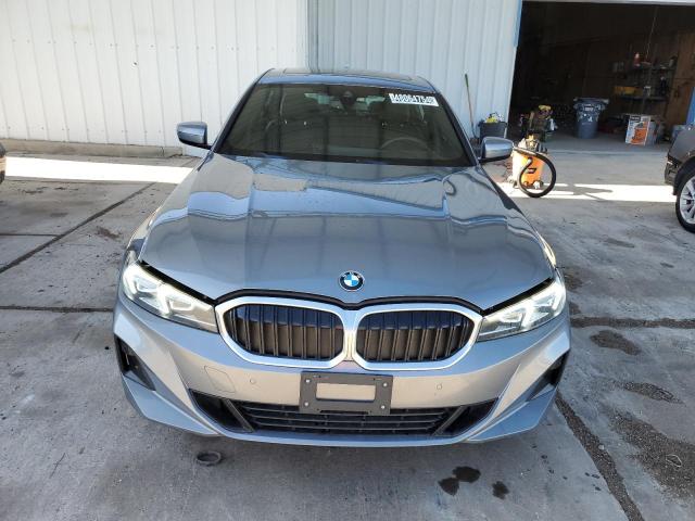 3MW89FF09P8D54633 - 2023 BMW 330XI BLUE photo 5