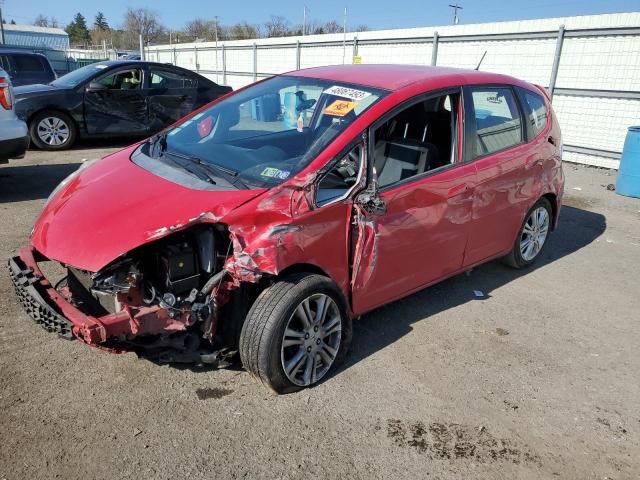 JHMGE88419S021087 - 2009 HONDA FIT SPORT RED photo 1