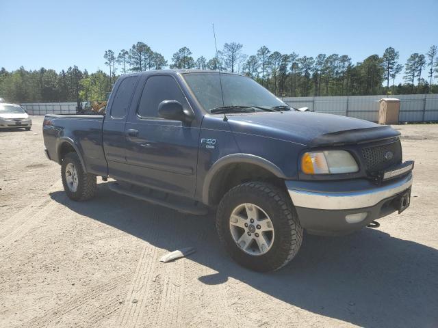 1FTRX18W93NB69149 - 2004 FORD F-150 BLUE photo 4