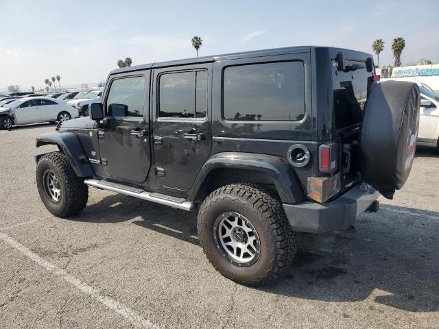 1J4BA7H12BL610196 - 2011 JEEP WRANGLER U JEEP 70TH ANNIVERSARY BLACK photo 2