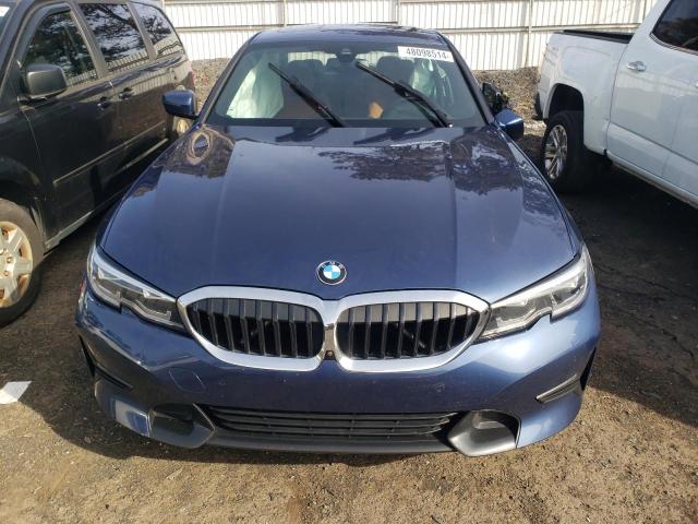 3MW5R7J05M8B52271 - 2021 BMW 330XI BLUE photo 5