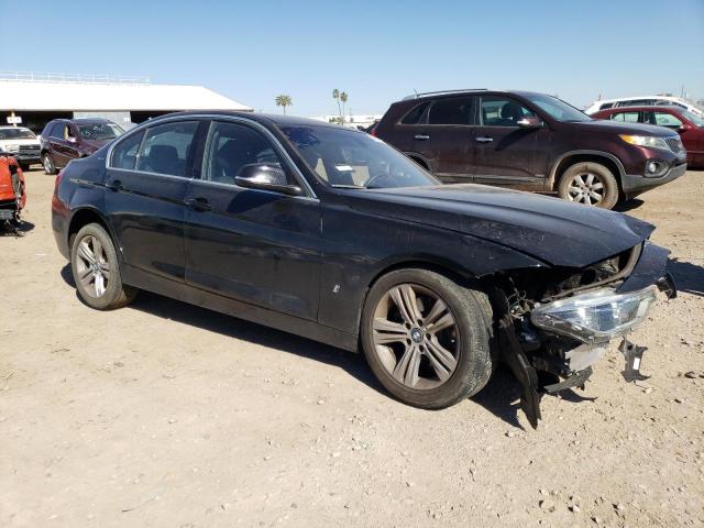 WBA8E1C55JA179971 - 2018 BMW 330E BLACK photo 4