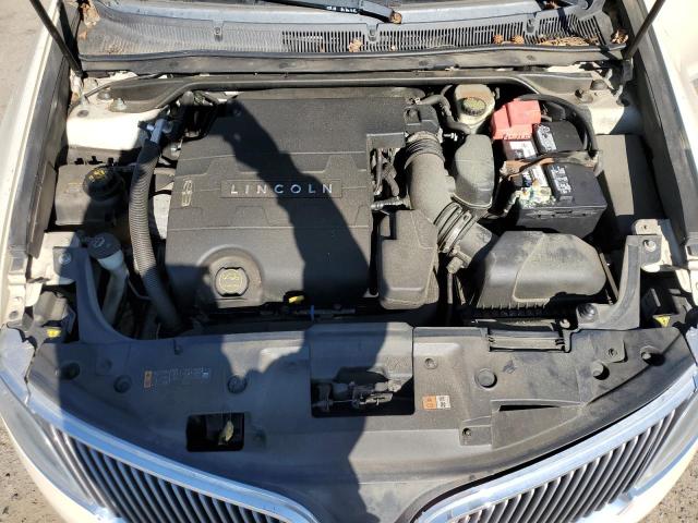 1LNHL9EK5EG611905 - 2014 LINCOLN MKS CREAM photo 11