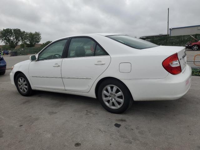 JTDBF30K130151721 - 2003 TOYOTA CAMRY LE WHITE photo 2