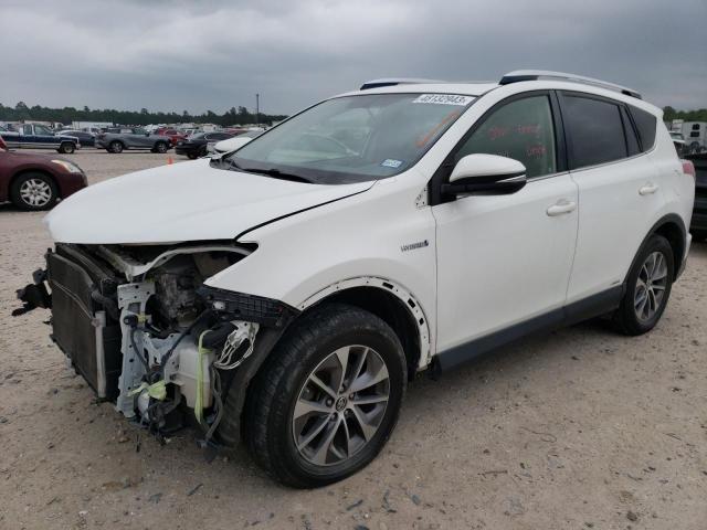 JTMRJREV8GD037720 - 2016 TOYOTA RAV4 HV XLE WHITE photo 1