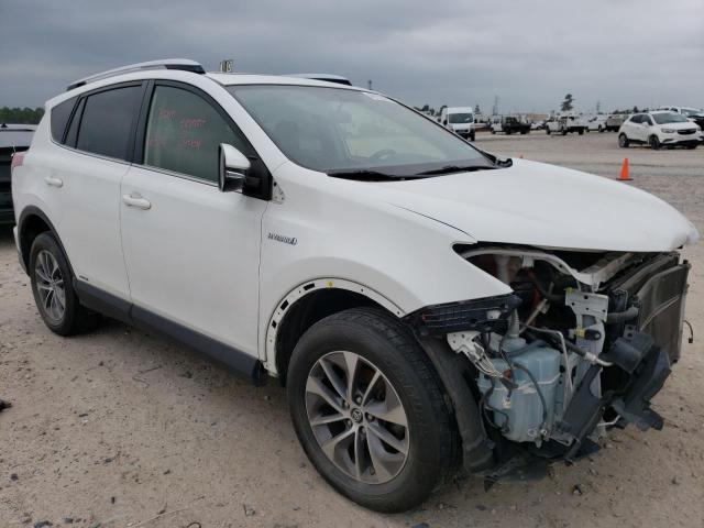 JTMRJREV8GD037720 - 2016 TOYOTA RAV4 HV XLE WHITE photo 4