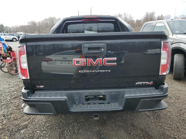 1GTG6FEN6M1128750 - 2021 GMC CANYON AT4 BLACK photo 6