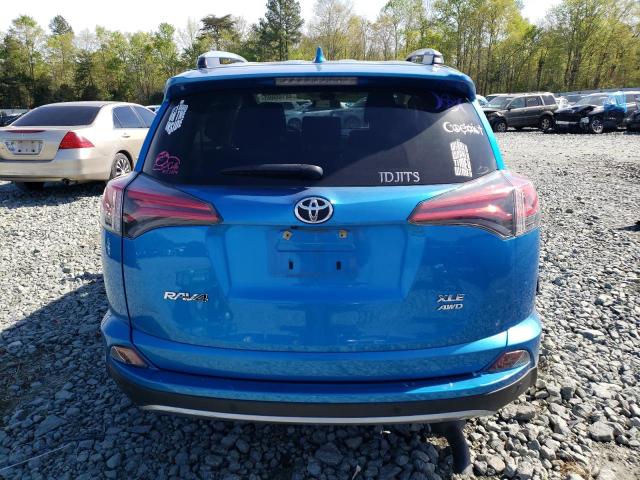 JTMRFREV6JD233583 - 2018 TOYOTA RAV4 ADVENTURE BLUE photo 6