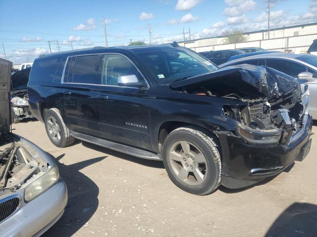 1GNSKJKC5HR324575 - 2017 CHEVROLET SUBURBAN K1500 PREMIER BLACK photo 4