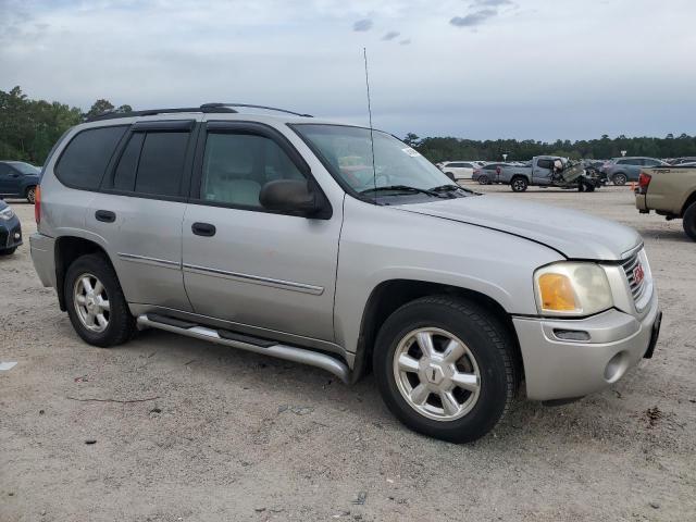 1GKDS13S382194414 - 2008 GMC ENVOY SILVER photo 4