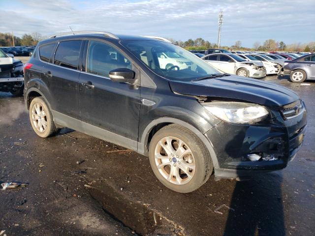 1FMCU0J94EUC90236 - 2014 FORD ESCAPE TITANIUM BLACK photo 4