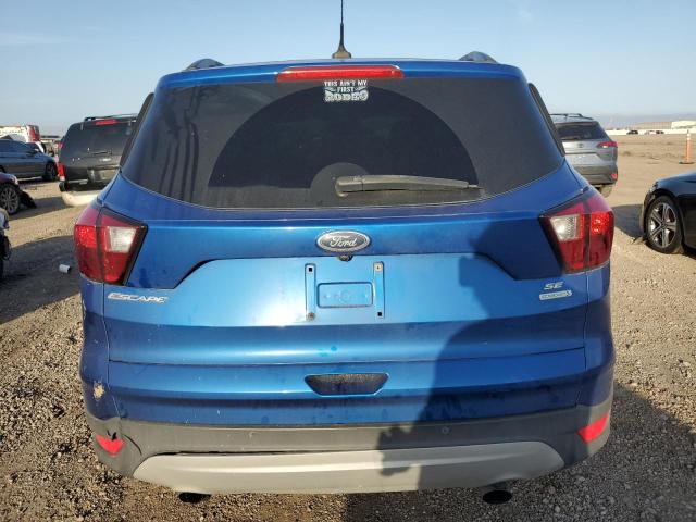 1FMCU0GD2KUB10873 - 2019 FORD ESCAPE SE BLUE photo 6