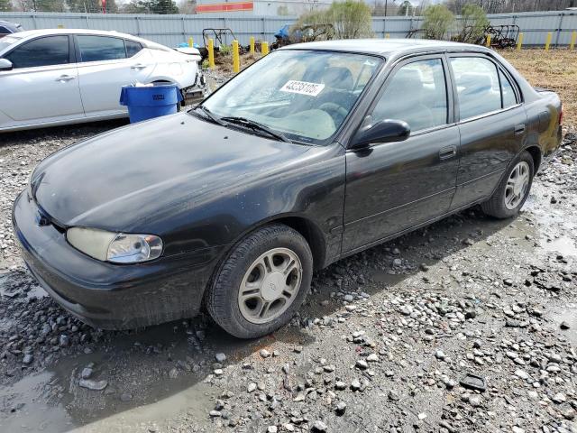 1Y1SK5280XZ436769 - 1999 CHEVROLET GEO PRIZM BASE BLACK photo 1