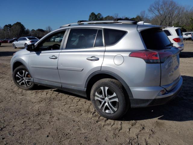 2T3ZFREV7GW296848 - 2016 TOYOTA RAV4 LE SILVER photo 2