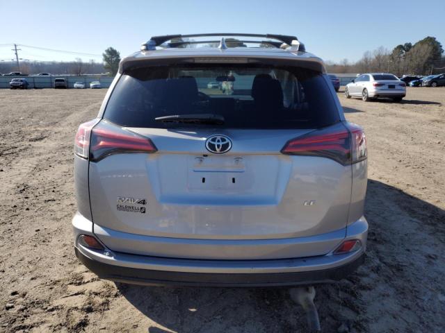 2T3ZFREV7GW296848 - 2016 TOYOTA RAV4 LE SILVER photo 6