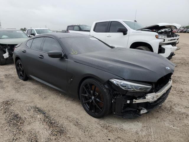 WBAGV8C02NCJ61348 - 2022 BMW M850XI BLACK photo 4