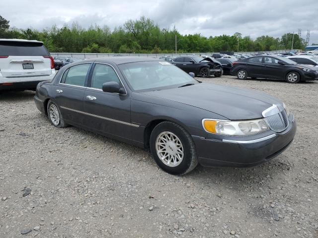 1LNHM82W5XY657519 - 1999 LINCOLN TOWN CAR SIGNATURE GRAY photo 4