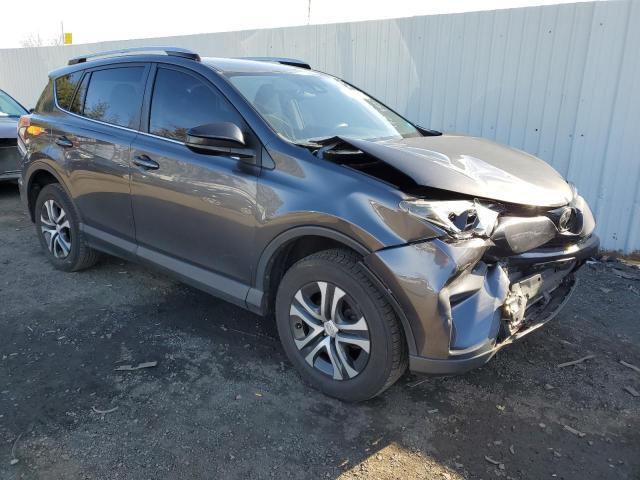 JTMBFREV6HJ117698 - 2017 TOYOTA RAV4 LE GRAY photo 4