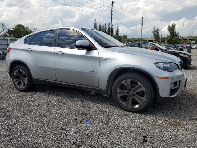 5UXFG2C57E0H11129 - 2014 BMW X6 XDRIVE35I SILVER photo 4