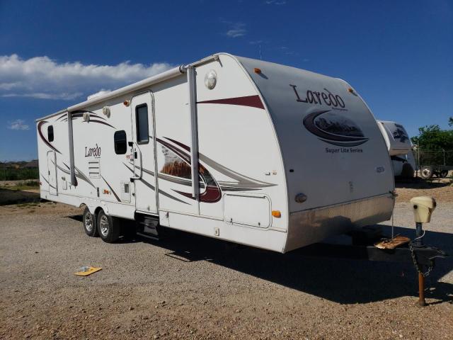 4YDT29B25AV602470 - 2010 KEYSTONE LAREDO WHITE photo 1