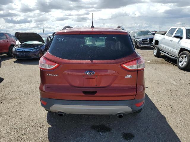 1FMCU9G90EUD65140 - 2014 FORD ESCAPE SE ORANGE photo 6