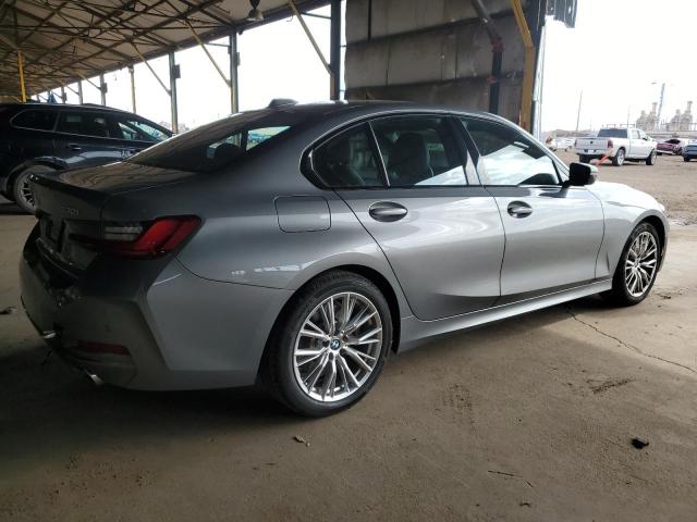 3MW69FF01P8D35338 - 2023 BMW 330I GRAY photo 3