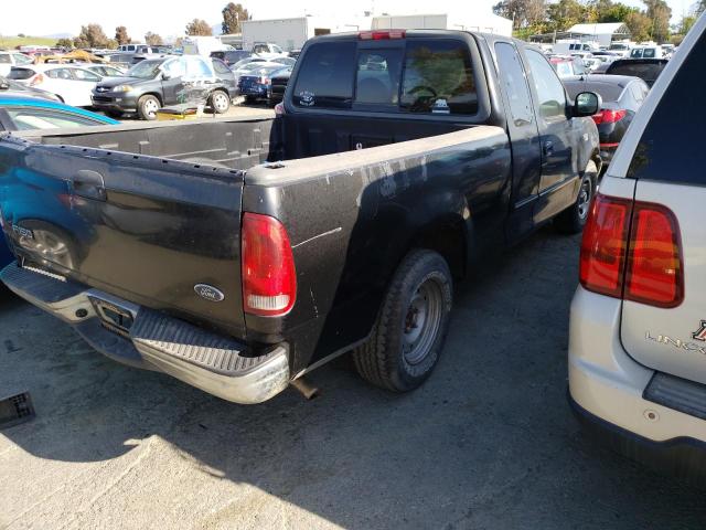 1FTZX1720YKB47029 - 2000 FORD F-150 BLACK photo 3