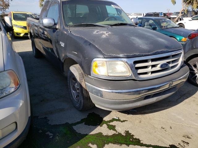 1FTZX1720YKB47029 - 2000 FORD F-150 BLACK photo 4