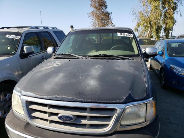 1FTZX1720YKB47029 - 2000 FORD F-150 BLACK photo 5
