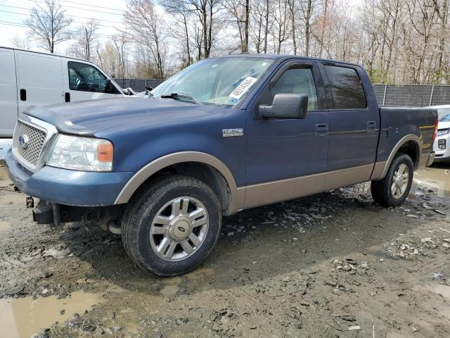 1FTPW12514KC24822 - 2004 FORD F150 SUPERCREW BLUE photo 1