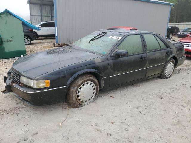 1G6KY5295RU802935 - 1994 CADILLAC SEVILLE STS BLACK photo 1