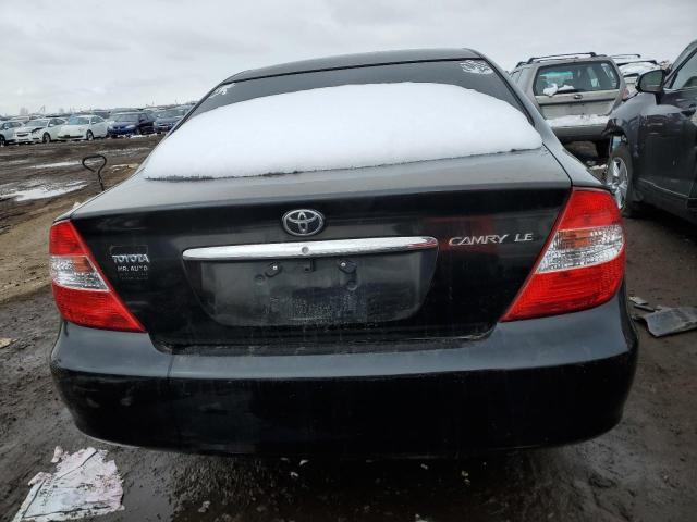 JTDBE32K620105736 - 2002 TOYOTA CAMRY LE BLACK photo 6