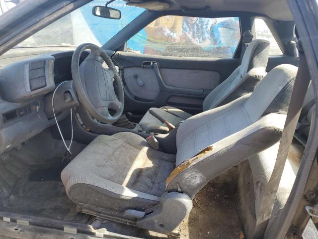 J81RF2365L7578670 - 1990 GEO STORM 2+2 Schwarz Foto 7