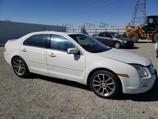 3FAHP07Z59R112704 - 2009 FORD FUSION SE WHITE photo 4