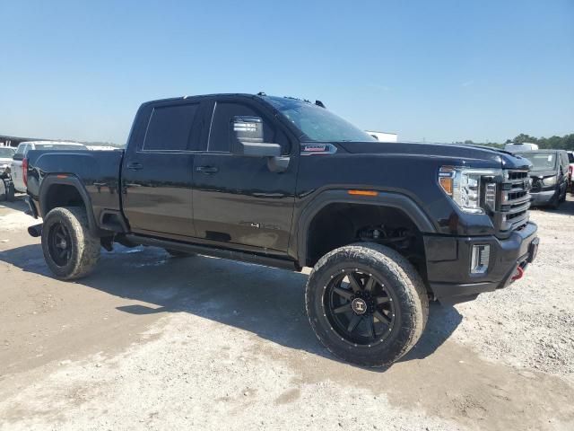 1GT49PEY6MF231650 - 2021 GMC SIERRA K2500 AT4 BLACK photo 4