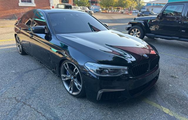 WBAJS7C01LCD90676 - 2020 BMW M550XI BLACK photo 1