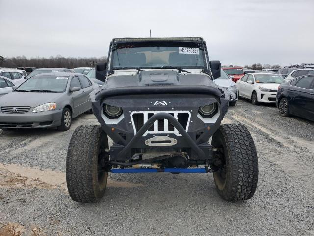 1C4BJWDG1EL251390 - 2014 JEEP WRANGLER U SPORT WHITE photo 5