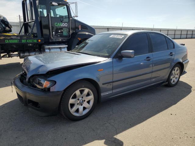 WBAAZ33414KP85534 - 2004 BMW 325 IS SULEV BLUE photo 1