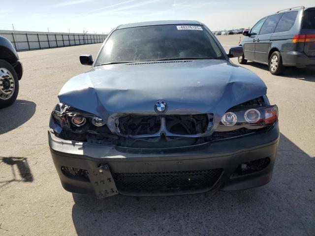 WBAAZ33414KP85534 - 2004 BMW 325 IS SULEV BLUE photo 5