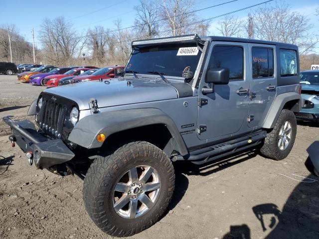 1C4BJWDGXGL335999 - 2016 JEEP WRANGLER U SPORT SILVER photo 1