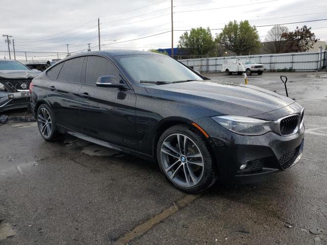 WBA8Z9C53JG827744 - 2018 BMW 330 XIGT BLACK photo 4