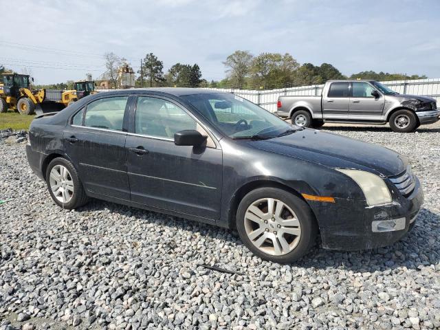 3FAHP08139R220568 - 2009 FORD FUSION SEL BLACK photo 4