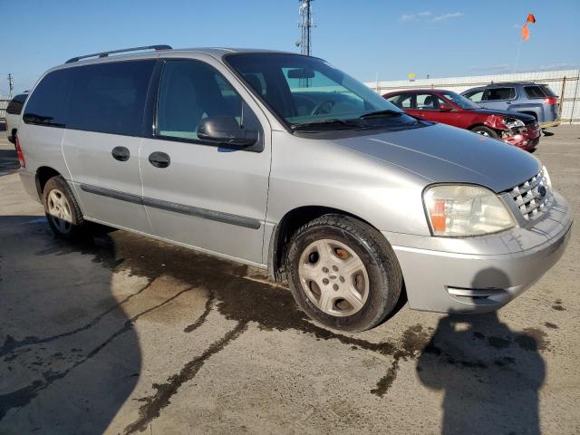 2FMZA51615BA32753 - 2005 FORD FREESTAR SE SILVER photo 4