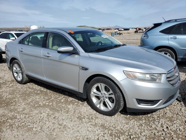 1FAHP2E86EG149817 - 2014 FORD TAURUS SEL SILVER photo 4