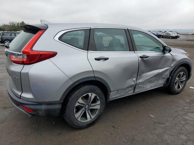 2HKRW6H35KH232879 - 2019 HONDA CR-V LX SILVER photo 3